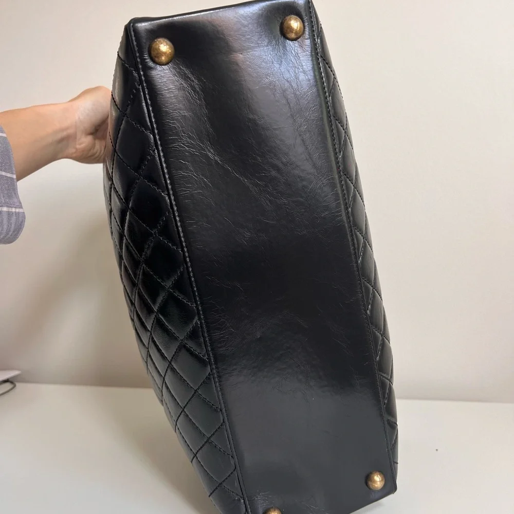 CHANEL Black Quilted Leather Laptop Tote with Gold Chain Strap